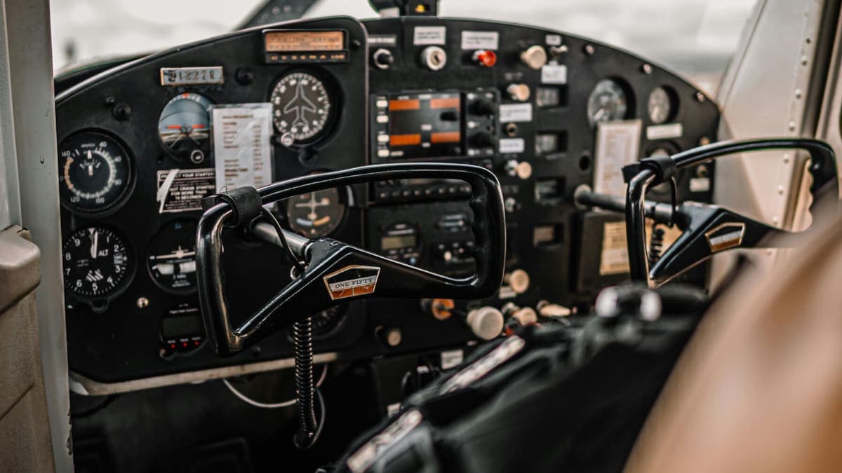 The instrument panel and yoke of a light aircraft